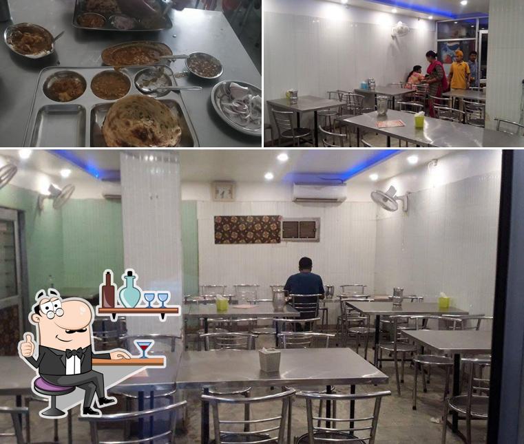 The image of interior and meat at Om Vaishno Dhaba