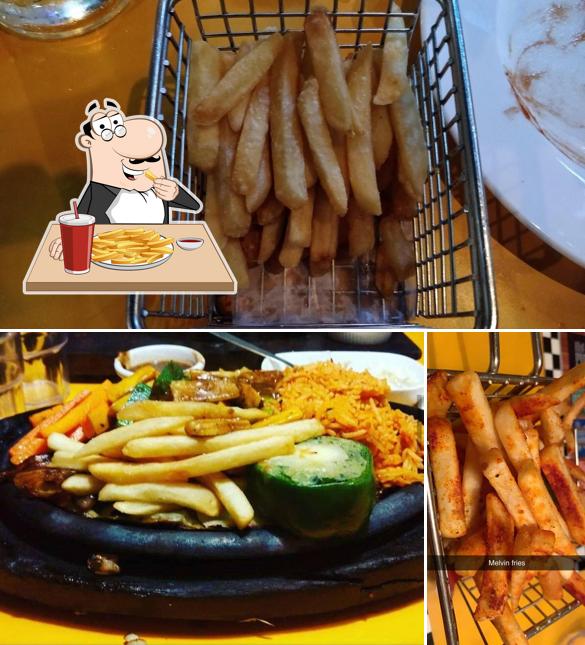 Taste French fries at Pop Tate's Seven Bungalows Andheri