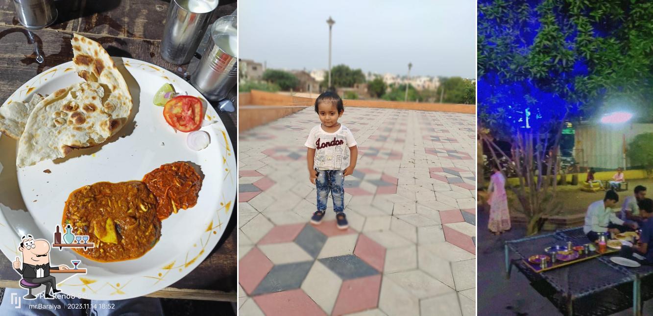 Take a seat at one of the tables at Ashapura Punjabi Dhaba