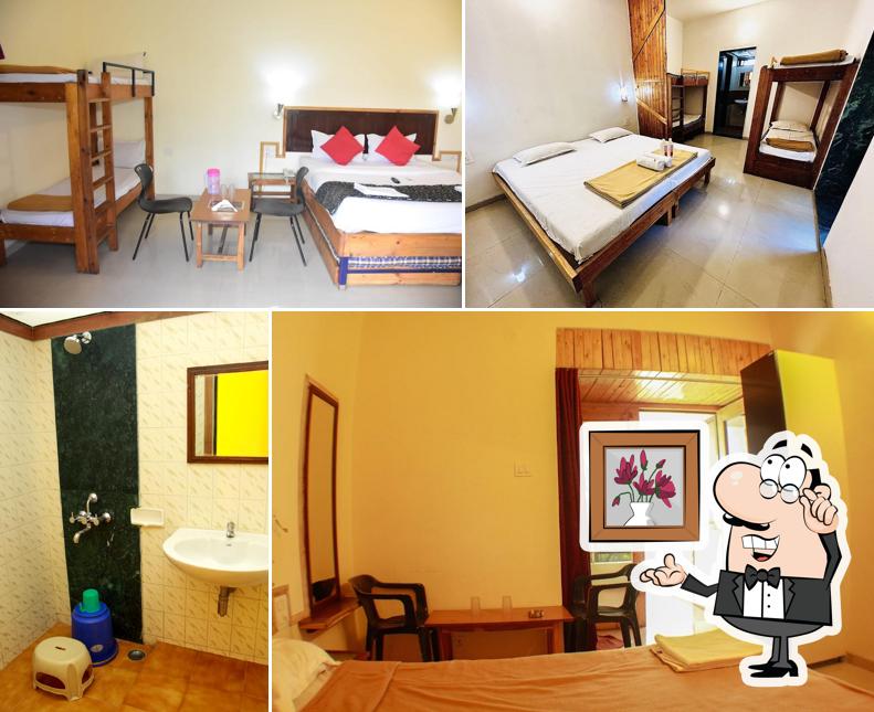 Take a seat at one of the tables at Rainwood Residency