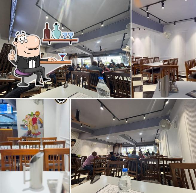 Take a seat at one of the tables at Shri Prasadam