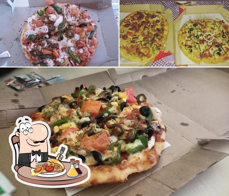 Pick pizza at Domino's Pizza Third City Mall , Bhopal