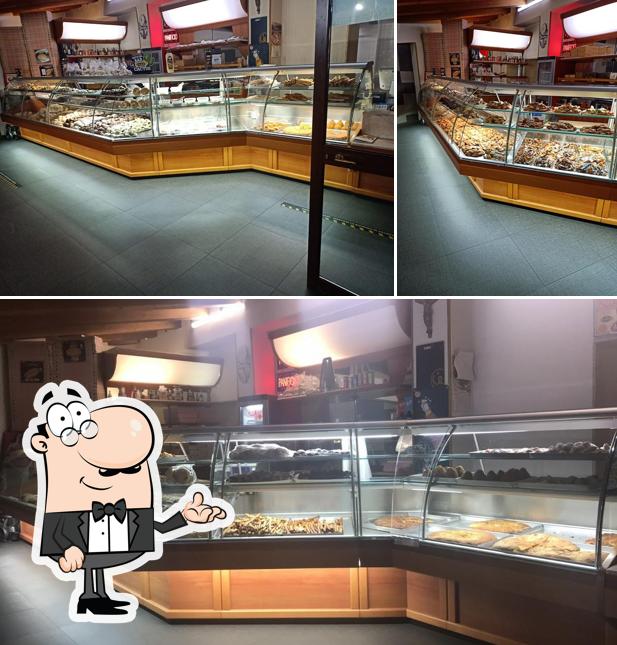 Dai un'occhiata agli interni di Pizzeria Panetteria Strano