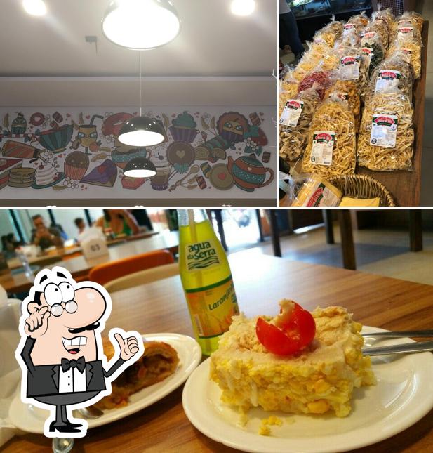 Sente em uma das mesas no Panificadora da Vila II