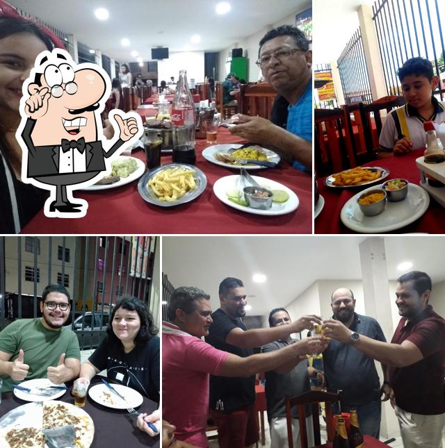 O interior do CHURRASCARIA E PIZARIA CANTINHO LOURO