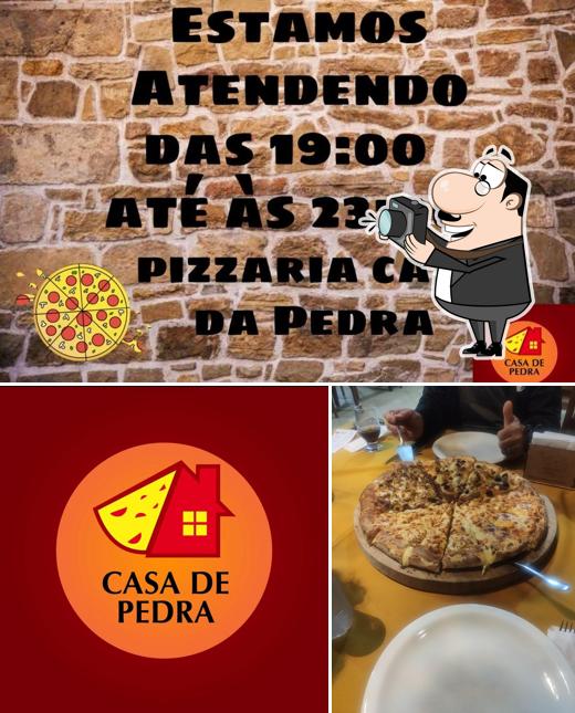 Look at this picture of Pizzaria Casa de Pedra