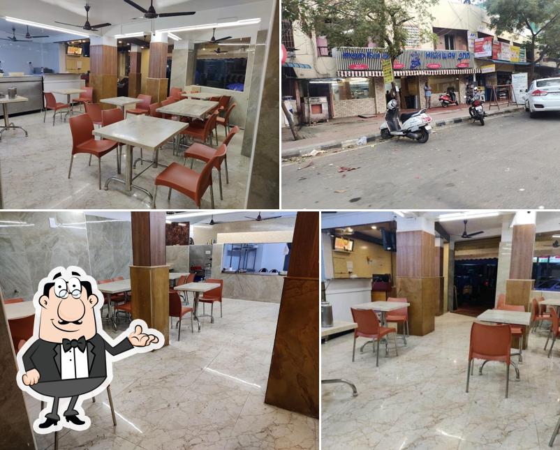 Take a seat at one of the tables at HIGHWAY INN SMART