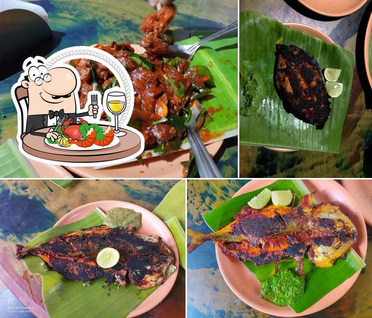 Get seafood at New Nandhi Fishland Dhaba