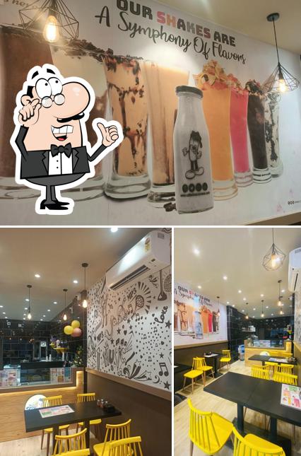 This is the image showing interior and food at Cafe choco craze