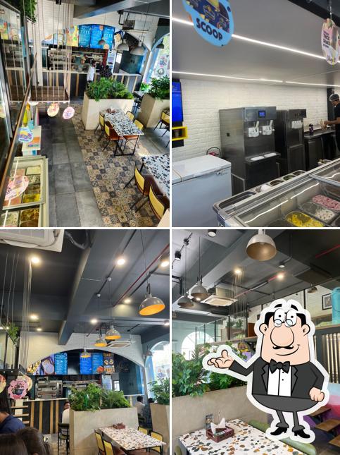 Take a seat at one of the tables at RP's Pizzeria SBR & i Contrast Ice Cream & Thick Shake