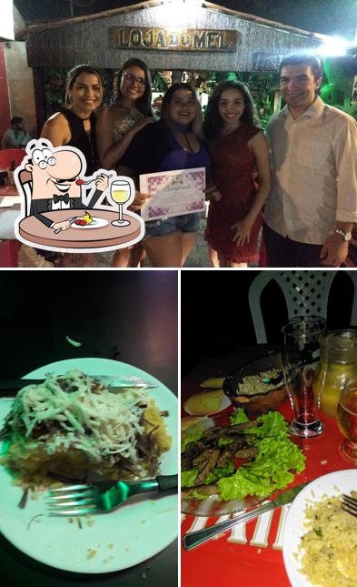 Entre diversos coisas, comida e balcão de bar podem ser encontrados a Amel Meruoca