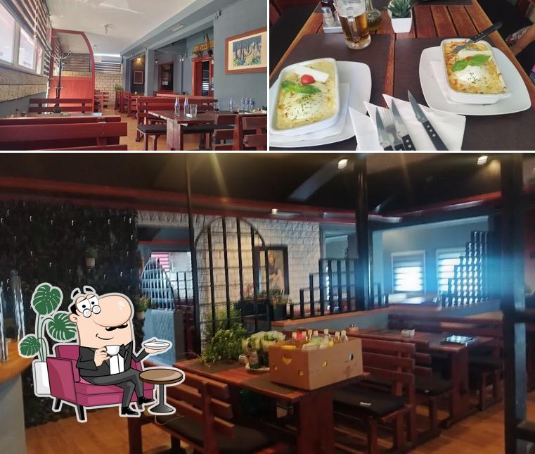 Guarda la immagine che raffigura la interni e cibo di Pizzeria Ivo Nr 1