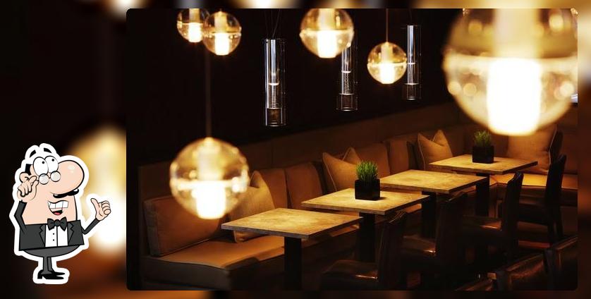 Take a seat at one of the tables at Dhaba66