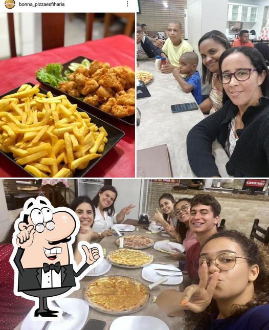 O interior do Bonna Pizza e Esfiharia
