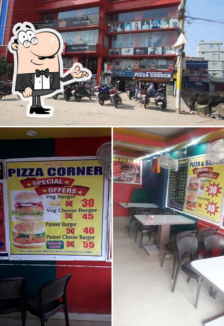 Among various things one can find interior and exterior at PIZZA CORNER
