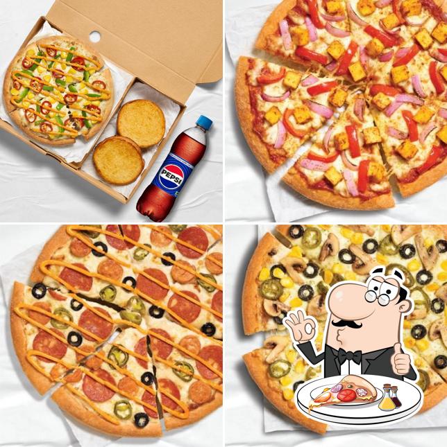 Pick pizza at Pizza Hut SV Road Malad West, Mumbai
