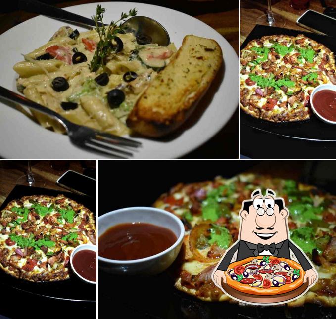 Get pizza at Air Lounge