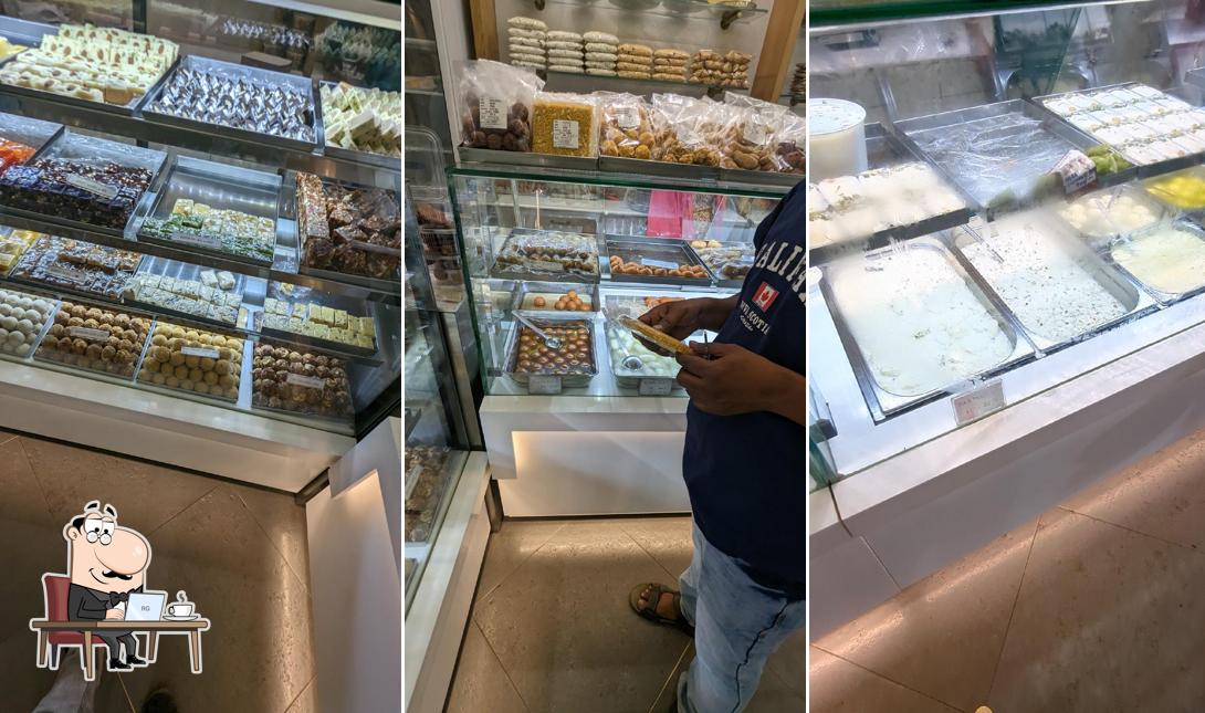 Take a seat at one of the tables at Rasapurna curry point