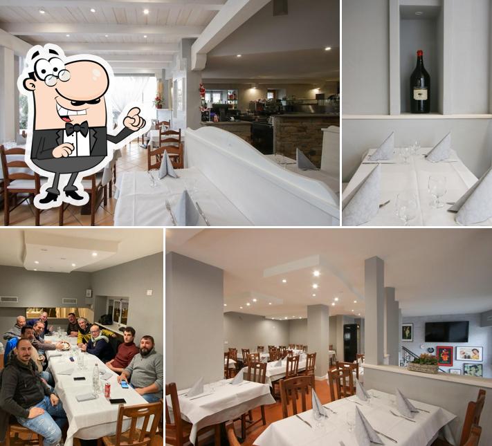 Siediti a un tavolo di Ristorante Pizzeria Postiglione