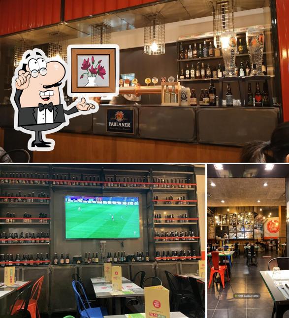 Dai un'occhiata agli interni di Pizza Garage