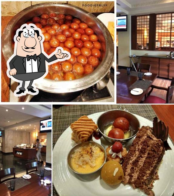 Take a seat at one of the tables at WelcomCafe Marina