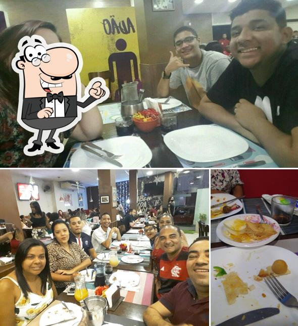 O interior do Abençoados Pizza & Grill