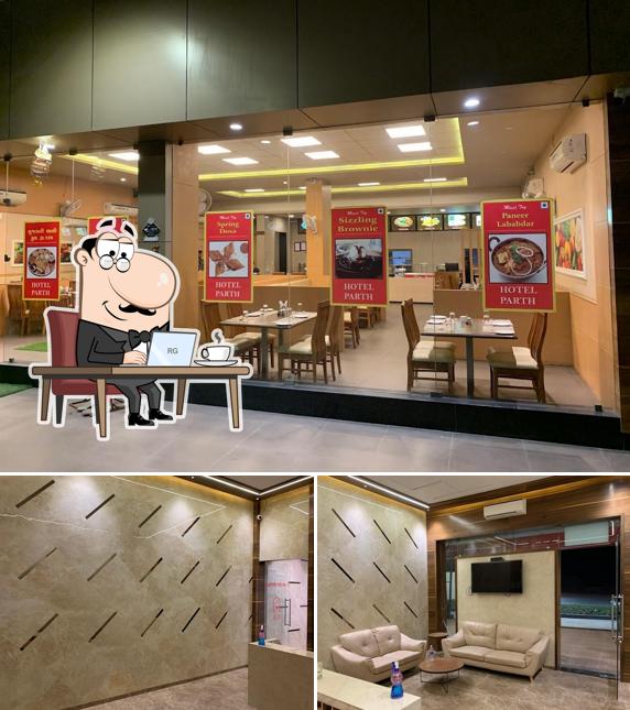 Check out how Hotel Parth - Restaurant looks inside