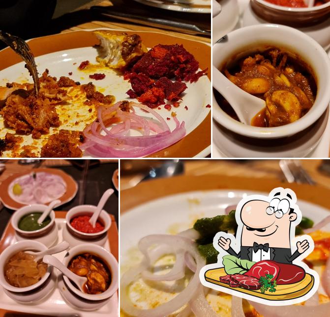 Pick meat dishes at Kebabs & Kurries Dwarka