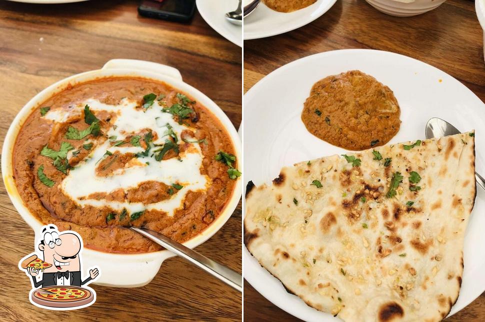 Get pizza at Solitaire Restaurant