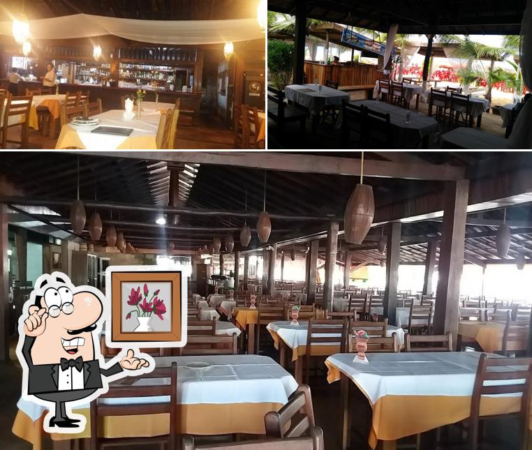 Sente em uma das mesas no Barraca do Gaúcho