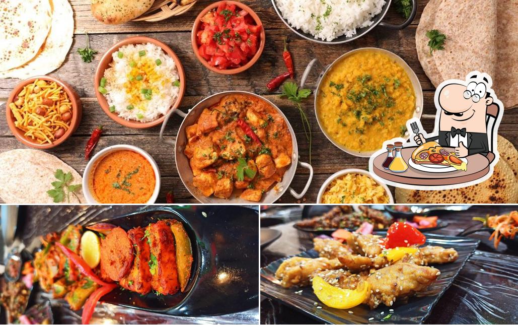 Get pizza at Hotel MLV Grand- A Multicuisine Restaurant