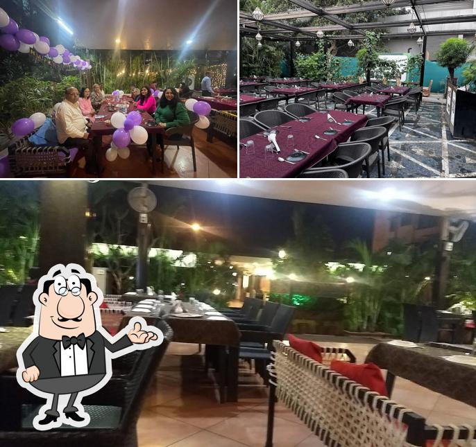 Take a seat at one of the tables at Veg Aroma