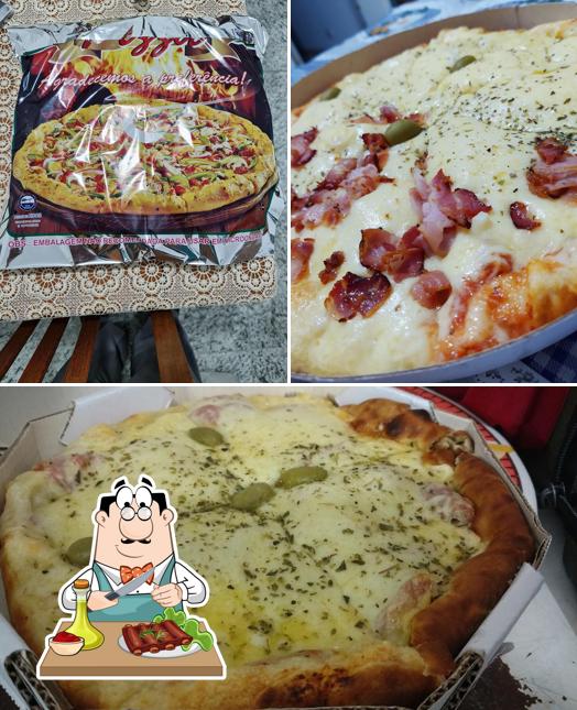 Peça refeições de carne no Pizzaria Brukutu