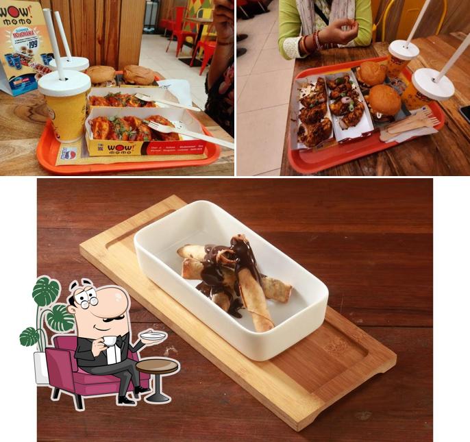 Check out the picture depicting interior and dining table at Wow! Momo