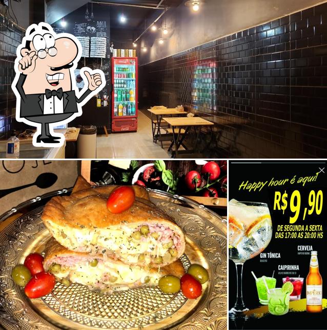 Sente em uma das mesas no Dei fratelli pizzaria