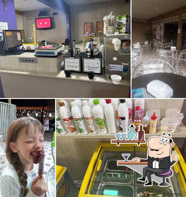 Sente em uma das mesas no Sorvetes Campo Grande