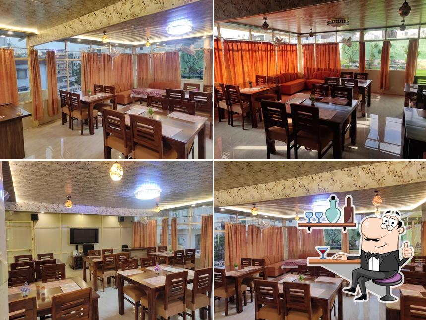 Take a seat at one of the tables at Trattoria italian restaurant