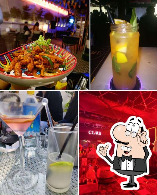 Take a seat at one of the tables at Clue Lounge and Bar