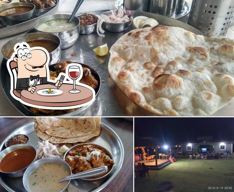 The image of food and play area at Hotel Bakula Garden