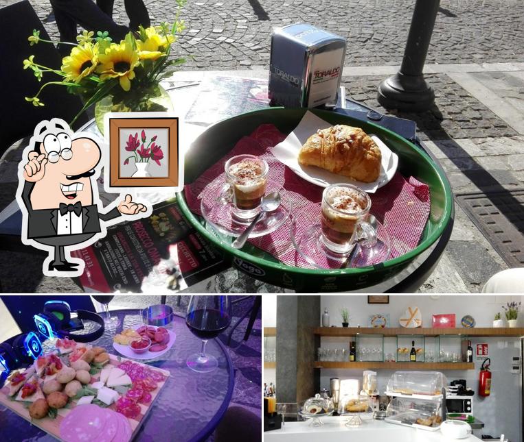 Dai un'occhiata agli interni di NEOS Cafè