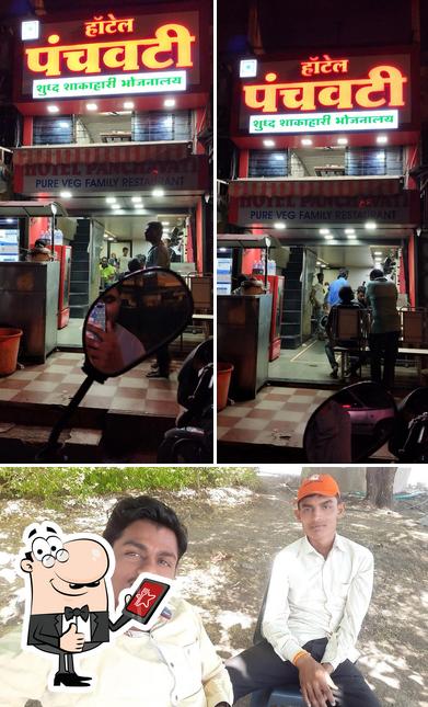 Look at this photo of Hotel Nashik Parivaar