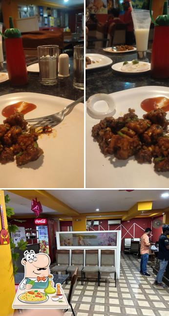 Among various things one can find food and interior at New Dhaba City Punjab