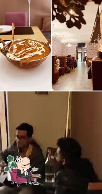 Take a seat at one of the tables at Lotus Restaurant