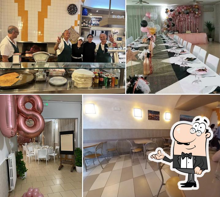 Dai un'occhiata agli interni di Pizzeria da Nando