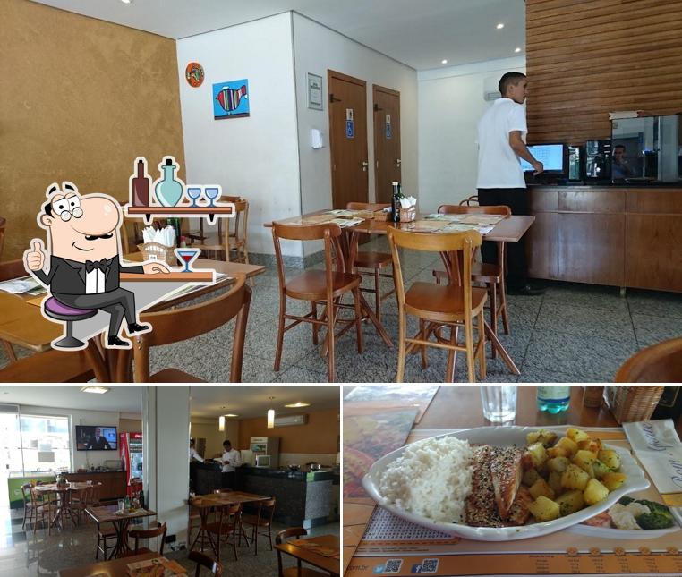 Dê uma olhada a foto apresentando interior e comida no Peixe Na Rede