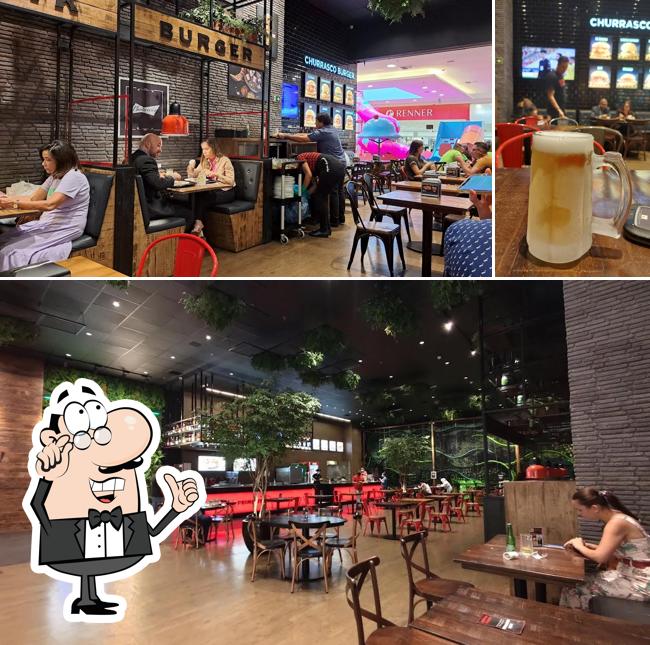 A imagem da interior e cerveja no Mania de Churrasco! Prime Steak & Burger
