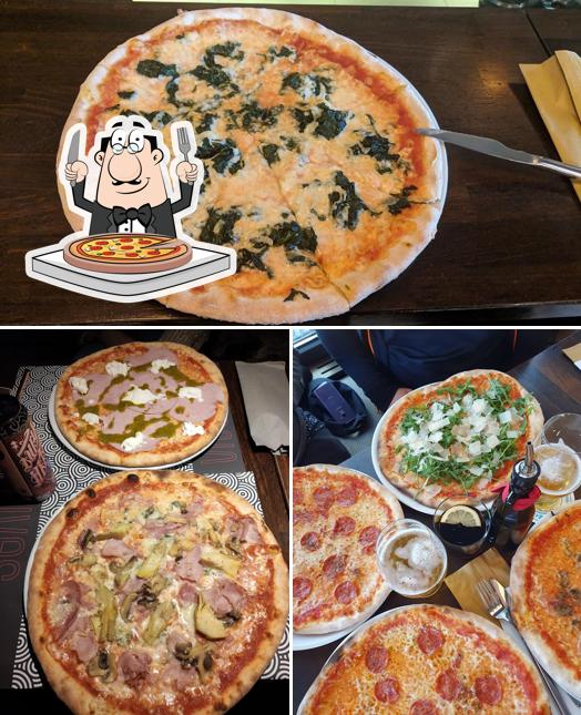 Scegli una pizza a Vives Pizza Loungebar