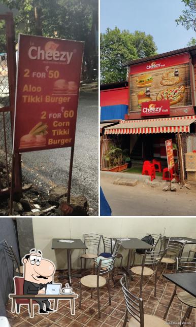 Take a seat at one of the tables at La Cheezy