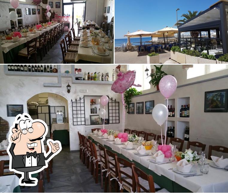 Guarda la immagine che mostra la interni e esterno di Ristorante Il Delfino