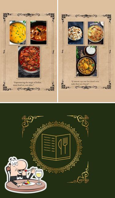 Confira a imagem apresentando comida e exterior a Madrasi Culinária Indiana